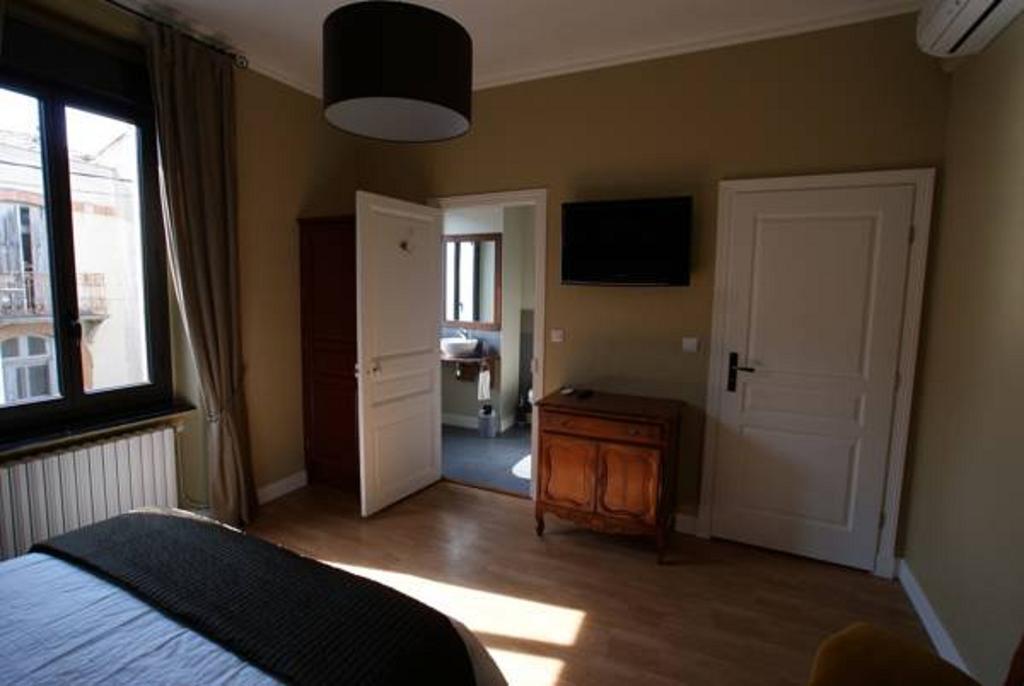 Carcassonne Guesthouse Bilik gambar